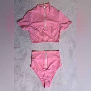 pink high-waisted bikini set with a zip-up crop top